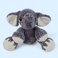 Crocheted grey seated elephant on a light blue background