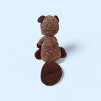 Brown crocheted Beaver on a blue background